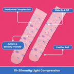 Pink compression socks with astrology pattern flatlay long