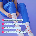 Nurse wearing white compression socks with red heart patterns