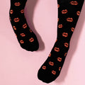 Black compression socks with red lip prints