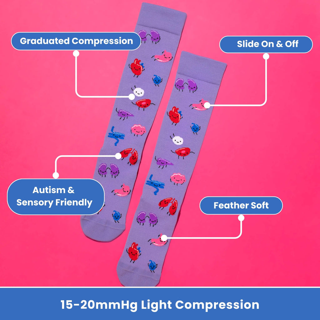 Purple compresion socks with organ pattern flatlay