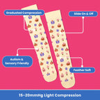 Beige compression socks with pumpkin spice pattern flatlay