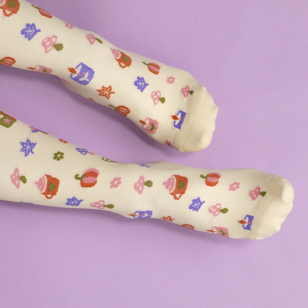 Beige compression socks with pumpkin spice pattern
