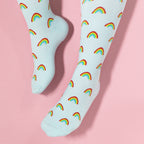 Light blue compression socks with rainbow patterns 