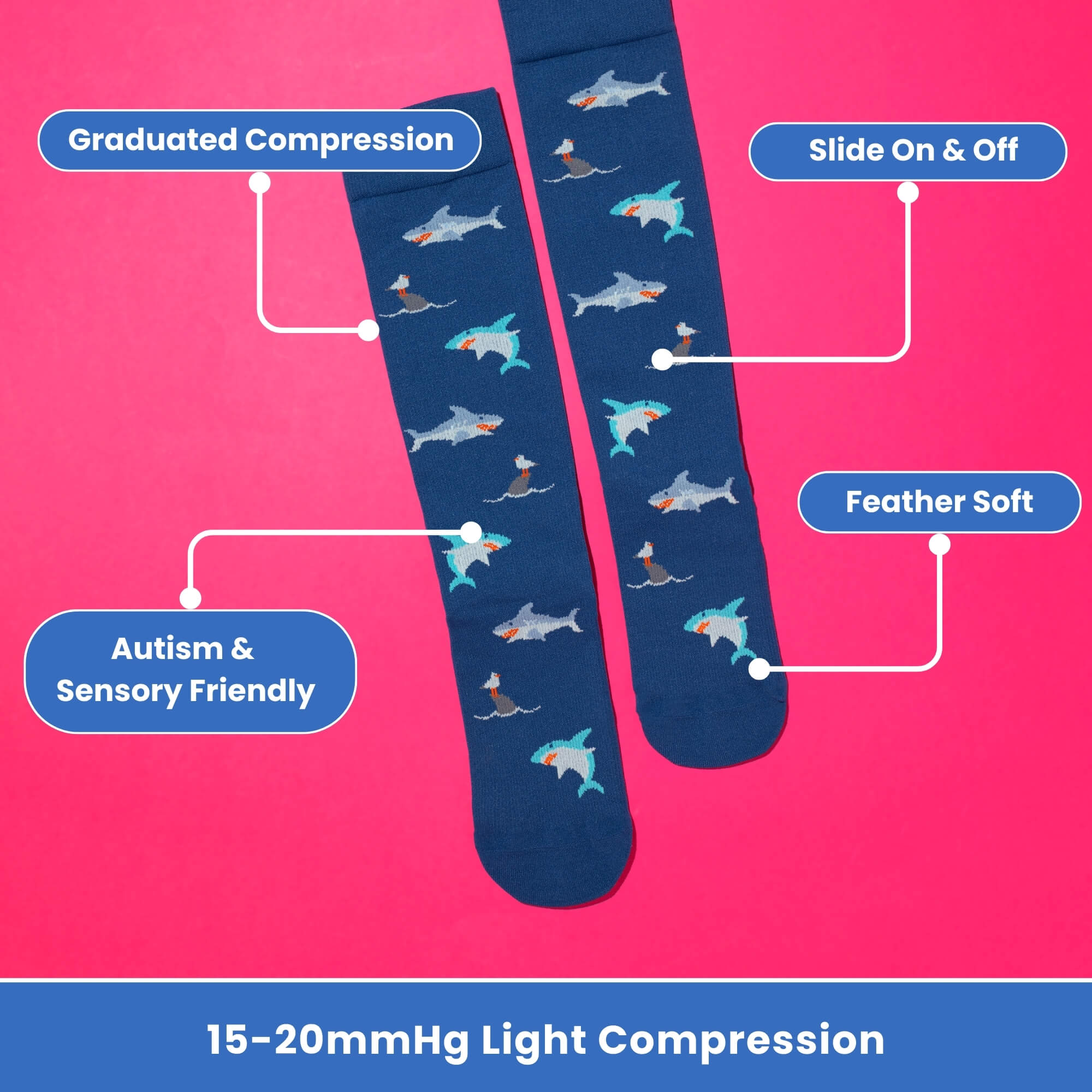 Navy blue compression socks with shark pattern flatlay