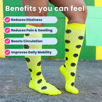 Woman wearing yellow compression socks with black smiley faces