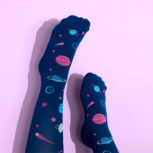Navy blue knee high compression socks with space-themed design